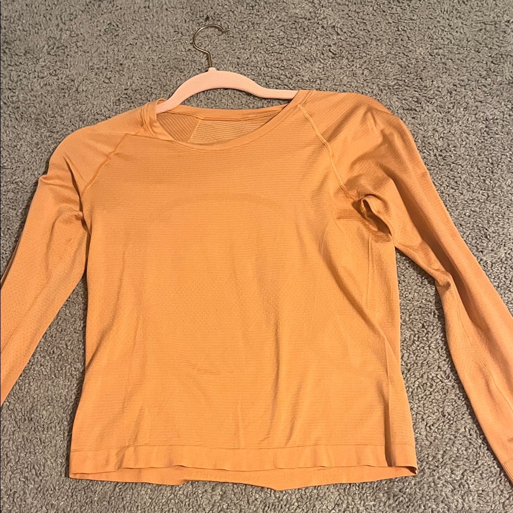 Lululemon Long sleeve cropped swiftly tech in Orange!!! No tags but rarely worn